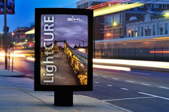 Blank Billboard on City Street at Night, traffic ligths, blurred train, urban scene